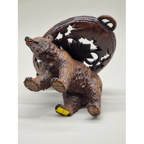 1564 - A Black Forest carved wood bear comport, 28cm wide, (probably associated).