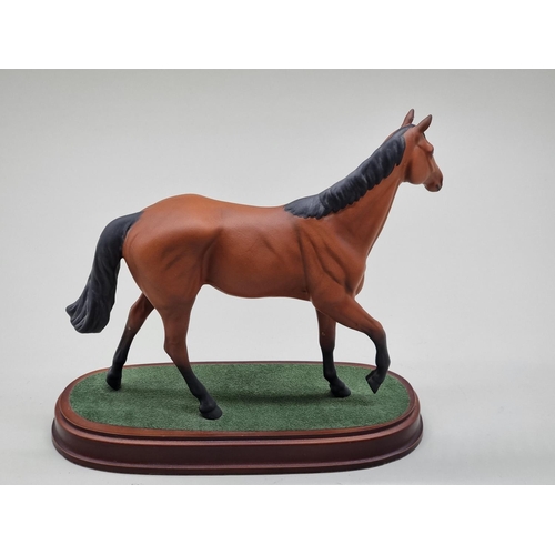 1568 - A Royal Doulton figure of Red Rum. 