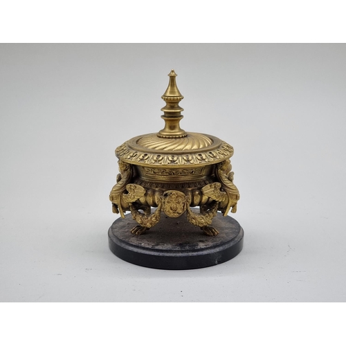 1571 - A Renaissance revival gilt bronze inkwell and cover, on slate base, 14cm high.