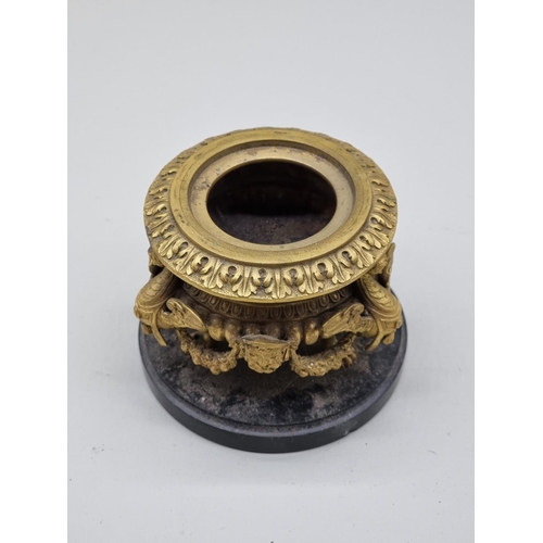 1571 - A Renaissance revival gilt bronze inkwell and cover, on slate base, 14cm high.