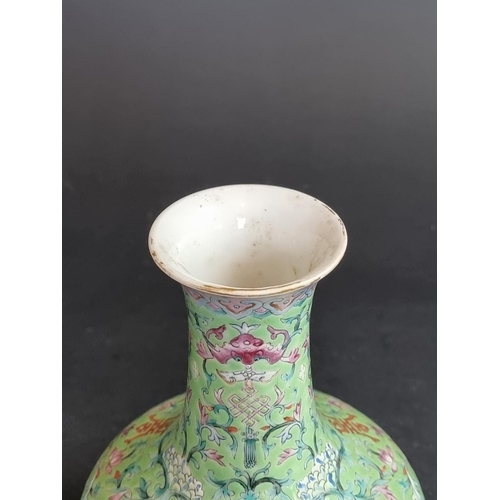 1578 - A Chinese lime-green ground famille rose vase, 17.5cm high.   