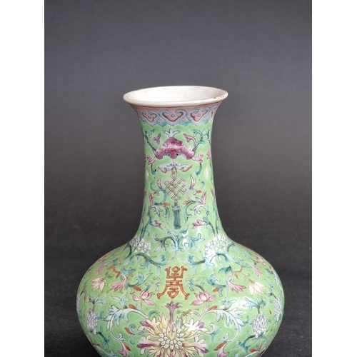 1578 - A Chinese lime-green ground famille rose vase, 17.5cm high.   