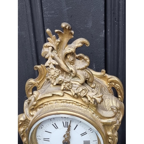 1579 - A Louis XV style gilt brass rococo mantel clock, 29.5cm high. 