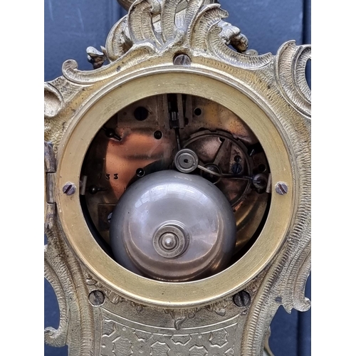 1579 - A Louis XV style gilt brass rococo mantel clock, 29.5cm high. 