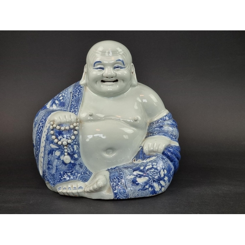1595 - A large Chinese blue and white Buddha, impressed mark to base, 27cm high.