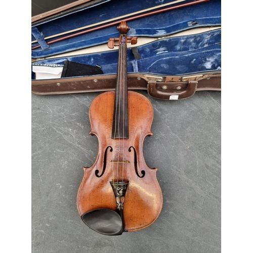 1665 - An antique Continental violin, with 14in one piece back, with bow and case.