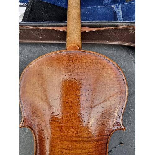 1665 - An antique Continental violin, with 14in one piece back, with bow and case.