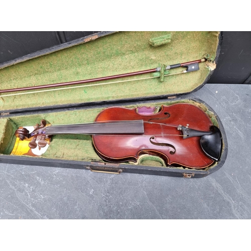 1666 - A small antique Continental violin, with 13in one piece back, with bow and ebonized case.  ... 