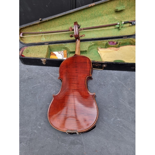 1666 - A small antique Continental violin, with 13in one piece back, with bow and ebonized case.  ... 