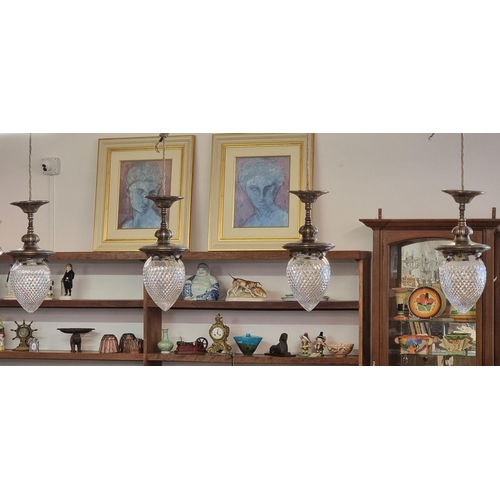 1669 - A good set of four Edwardian cut glass and electroplated ceiling pendant lights, each with matching ... 