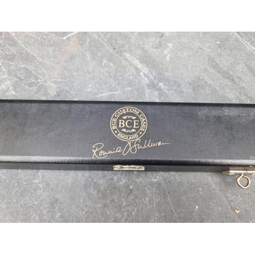 1675 - An 'RLE Customs Cues' two-piece snooker cue, in BCE Ronnie O'Sullivan case. 