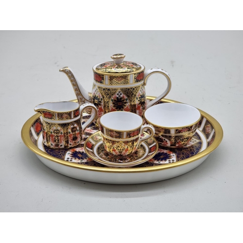 1683 - A Royal Crown Derby Imari miniature bachelor's teaset, the tray 19.5cm wide.