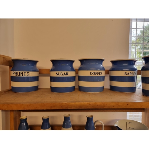 1688 - Eight T G Green & Co Cornishware storage jars and covers, largest 15cm high, (s.d. to some)... 