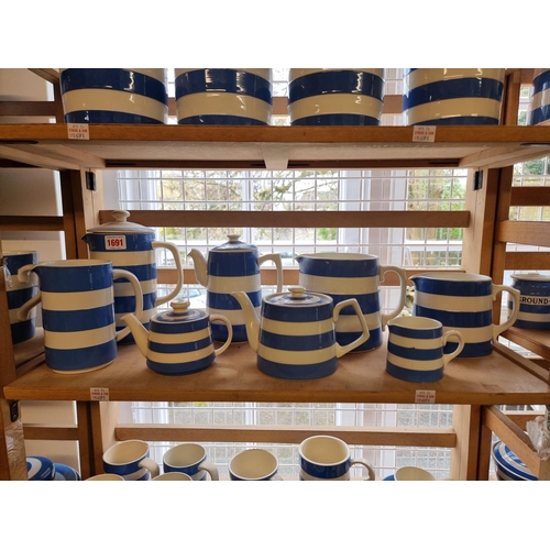 1691 - A large collection of T G Green & Co Cornishware, all unnamed, various dates. (six shelves)... 