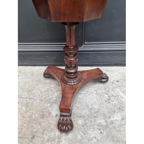 1057 - A Victorian mahogany octagonal trumpet work table, 42cm wide. 