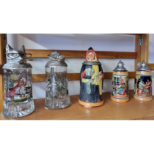 1721 - A mixed group of ceramics, to include novelty beer steins.