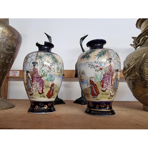 1724 - A mixed group of Oriental items, to include a pair of Chinese brass vases, 24cm high; together ... 