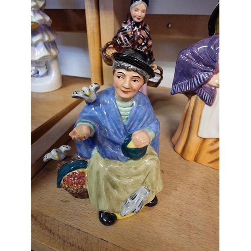 1741 - Ten Royal Doulton 'Miniature Street Vendors'; together with a Royal Doulton resin Pied Piper. (11)... 