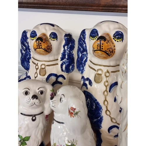 1742 - Three pairs of Staffordshire style dogs, largest 31cm high.