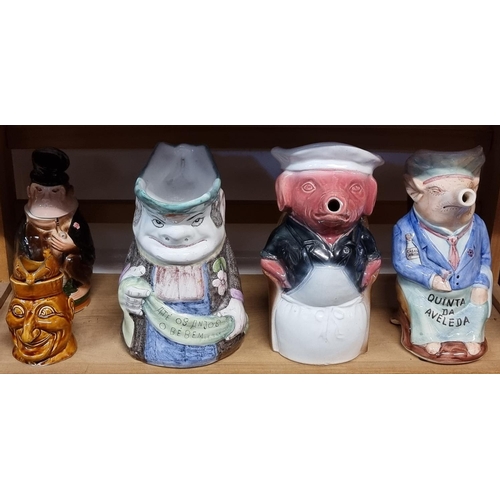 1747 - Five novelty character jugs, largest 26.5cm high.