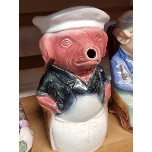 1747 - Five novelty character jugs, largest 26.5cm high.