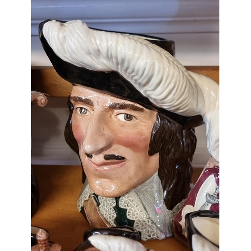 1749 - A collection of Royal Doulton musketeers character jugs. (12)