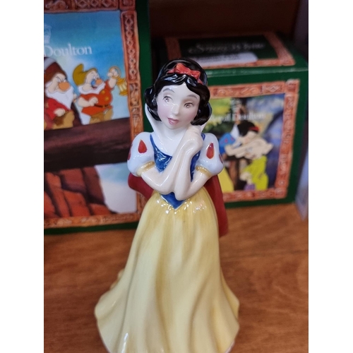 1752 - A set of Royal Doulton Snow White and The Seven Dwarfs figures, each boxed.