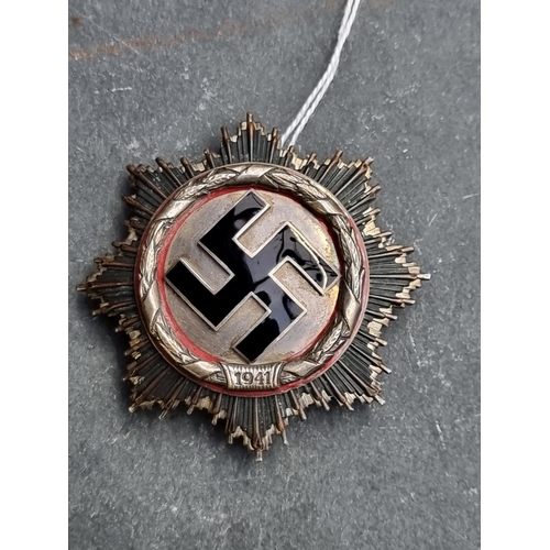 219 - Medals: a good quality reproduction Third Reich German Cross, in silver, boxed.... 