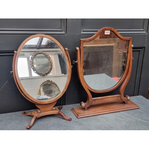 1071 - Two Georgian style mahogany skeleton frame toilet mirrors, largest 55cm high. (2)