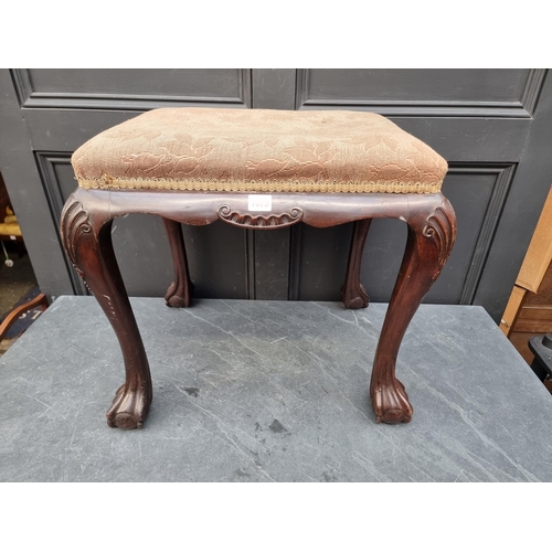 1075 - A 1930s, 18th century style, carved walnut and upholstered stool, 55cm wide. ... 