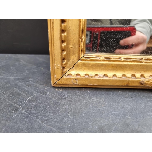 1110 - A 19th century gilt framed rectangular wall mirror, 89 x 67cm.  