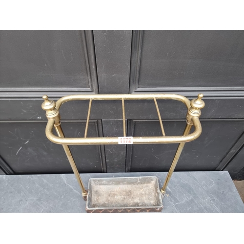 1172 - An old brass stick stand, 37cm wide.