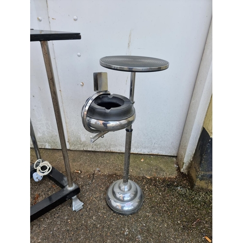 1228 - An Art Deco chrome and ebonized adjustable lamp table; together with a similar smokers stand, 7... 