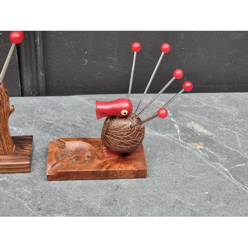 1587 - A rosewood cocktail stick stand, 14cm wide; together with another; and one other similar item. ... 