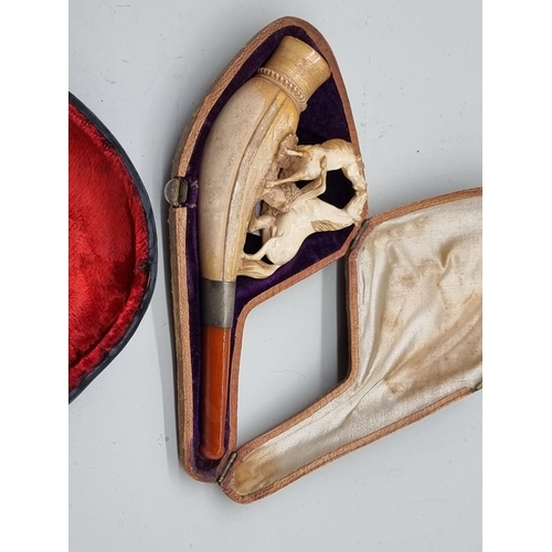 1618 - Two cased meerschaum pipes.