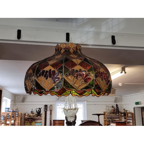 1668 - A large Tiffany style lamp shade, 64.5cm wide.