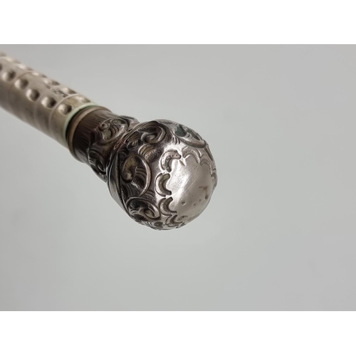 1768 - An antique shark vertebrae swagger stick, 70cm long.