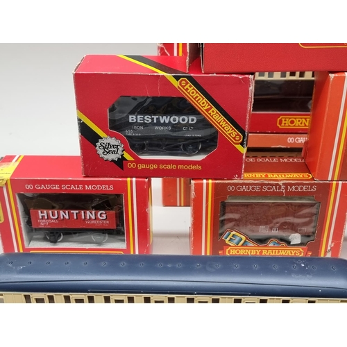 1808 - Railway: Hornby 00 gauge: a collection of coaches and wagons; together with a signal, most boxe... 