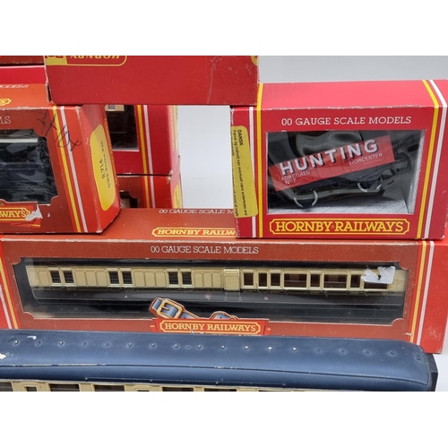 1808 - Railway: Hornby 00 gauge: a collection of coaches and wagons; together with a signal, most boxe... 