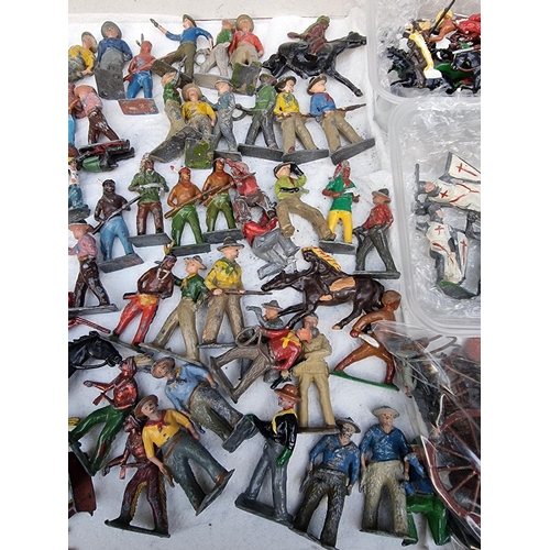 1826 - Vintage Lead: a collection of figures, including native Americans and cowboys, some mounted, wi... 