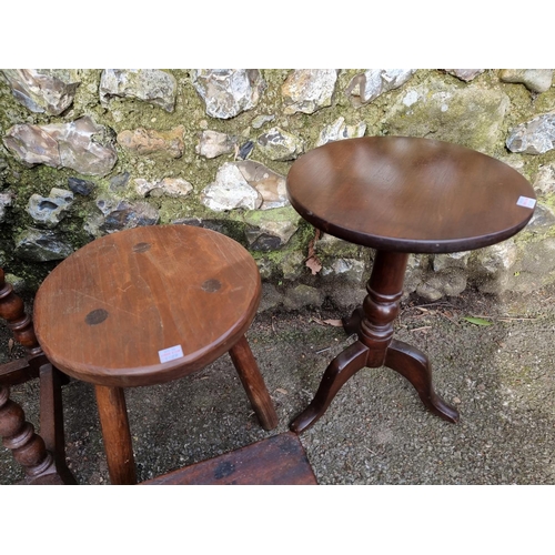 1129 - A reproduction oak joint stool, 46cm wide; together with an oak three legged stool; an unusual mahog... 