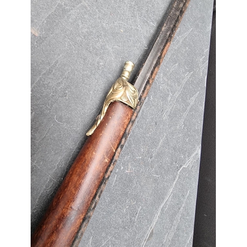 1170 - A reproduction flintlock musket; together with two similar pistols. (3)