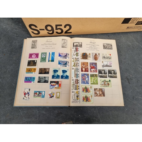 1400A - Stamps: a collection of albums and stock books. 