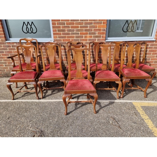 1094 - A set of twelve early 18th century style mahogany dining chairs, to include an elbow chair, (one sta... 