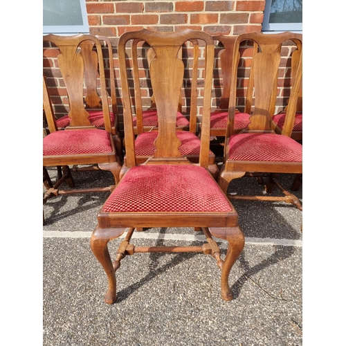 1094 - A set of twelve early 18th century style mahogany dining chairs, to include an elbow chair, (one sta... 