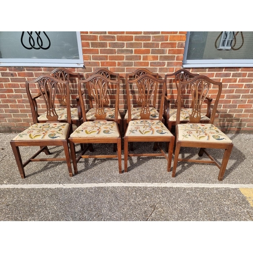 1127 - A set of eight George III style mahogany dining chairs, each with tapestry slip in seat, to include ... 