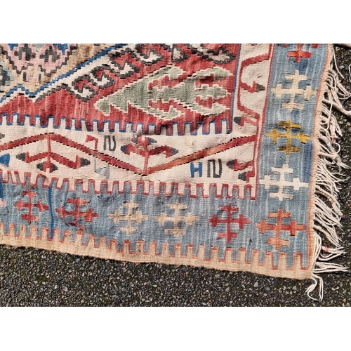 1139 - A Kelim flatweave rug, 194cm x 116cm.