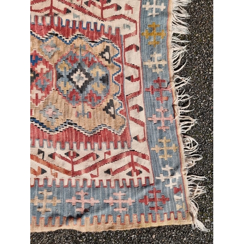 1139 - A Kelim flatweave rug, 194cm x 116cm.