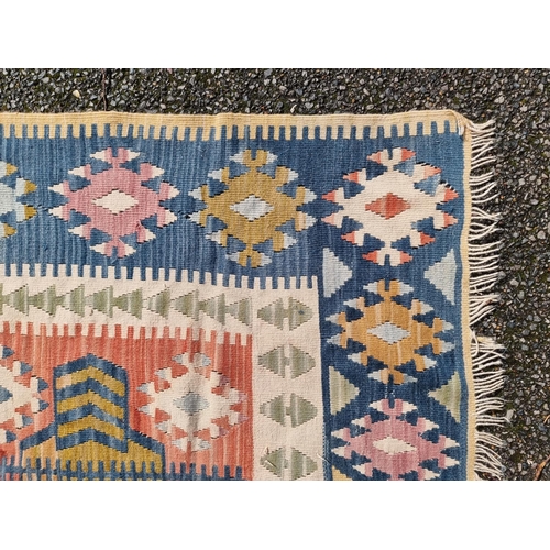 1140 - A Kelim flatweave rug, 194 x 113cm.