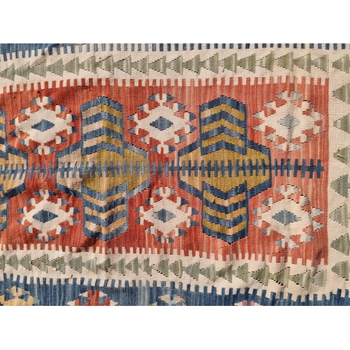 1140 - A Kelim flatweave rug, 194 x 113cm.